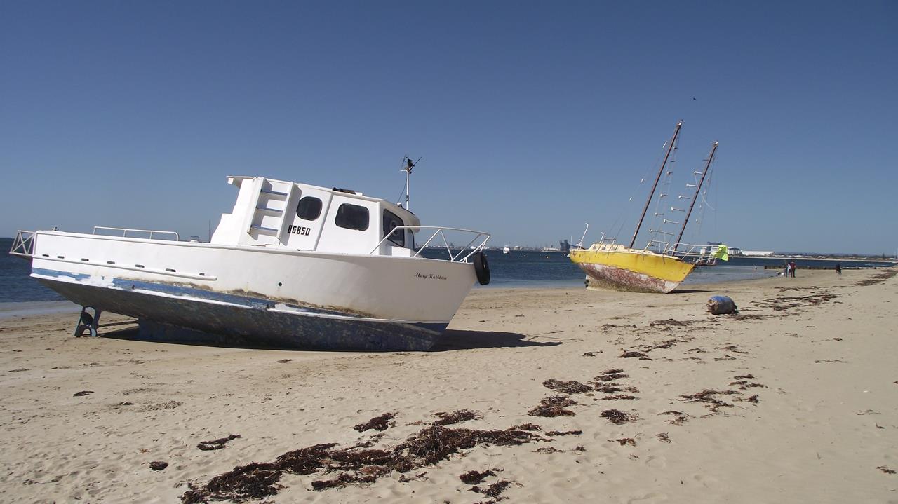 Beached boats, Rockingham, Western Australia.